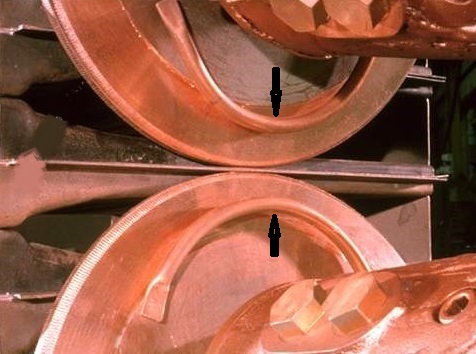 A1 178a Close up of weld wheels on part with cooling